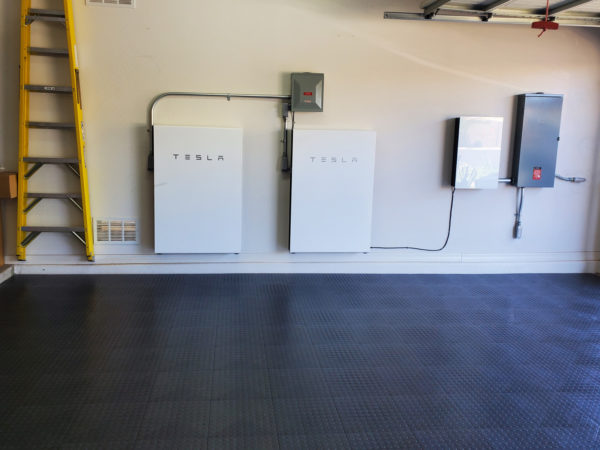 GarageDeck garage with Tesla Power Wall