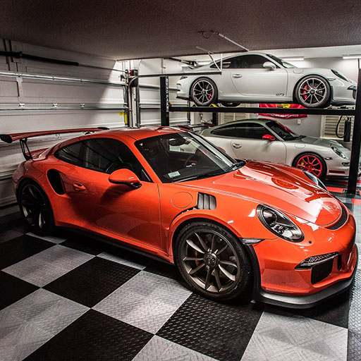 Three Porsches in a garage with RaceDeck Garage Floors