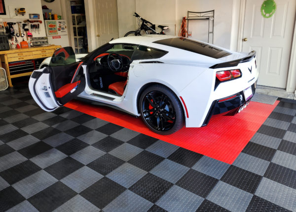 Corvette parked in a garage with GarageDeck garage floor tiles