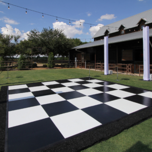 Slate black and white plus dance floor at a farm event venue