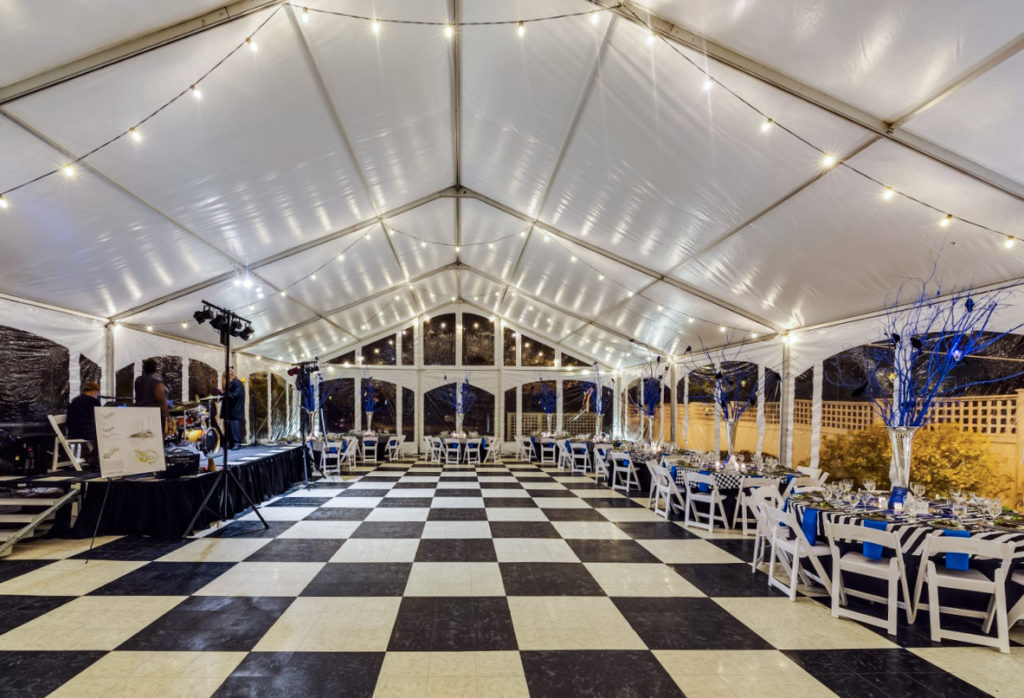 tent interior at night dance floor An interlocking dance floor installed in a tent