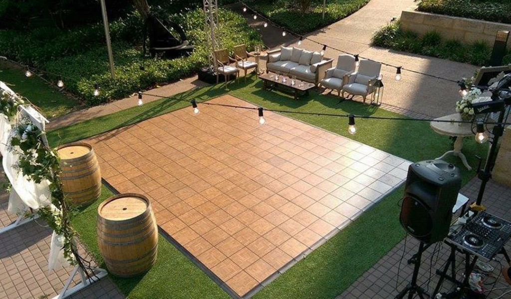 Portable dance floor at a backyard event