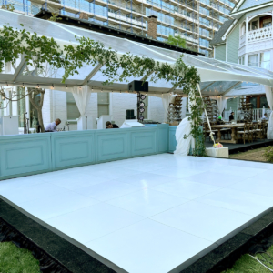 Slate white plus dance floor at tent event setup